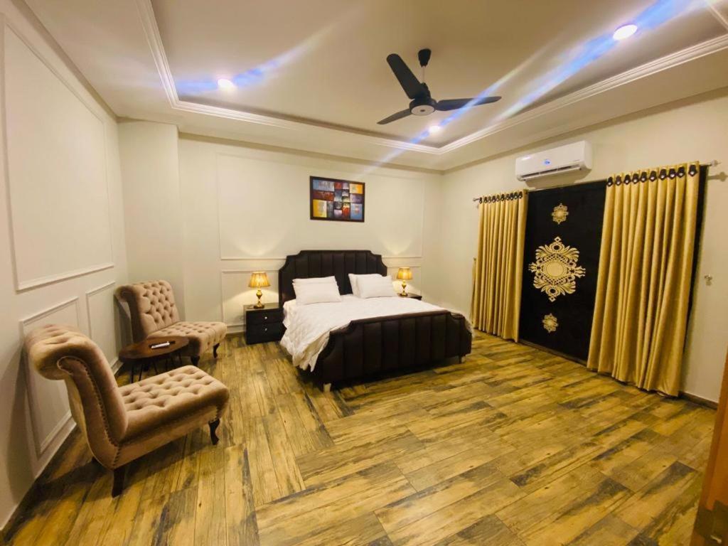 Holidazzle Serviced Apartments Bahria Town Равалпинди Екстериор снимка