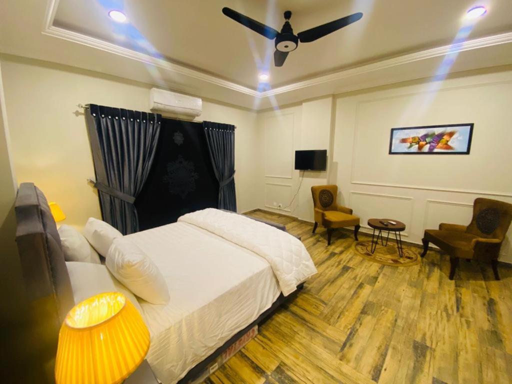 Holidazzle Serviced Apartments Bahria Town Равалпинди Екстериор снимка