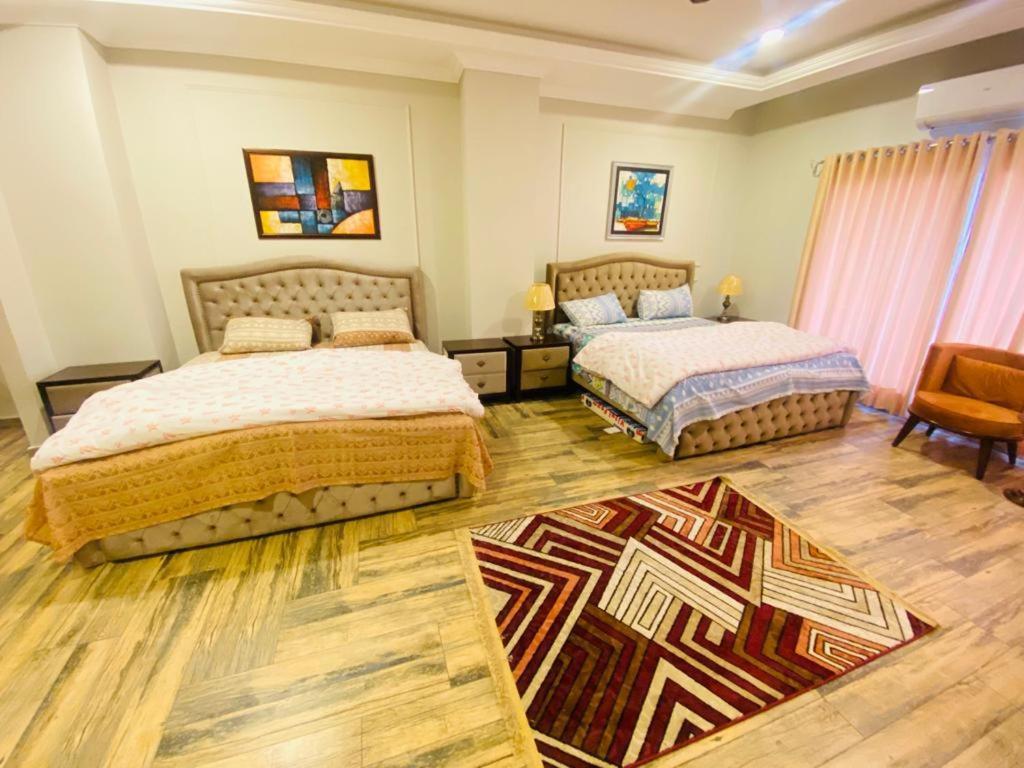 Holidazzle Serviced Apartments Bahria Town Равалпинди Екстериор снимка