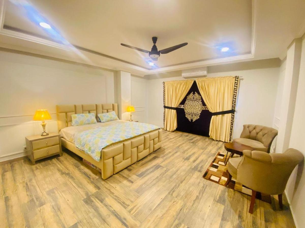 Holidazzle Serviced Apartments Bahria Town Равалпинди Екстериор снимка