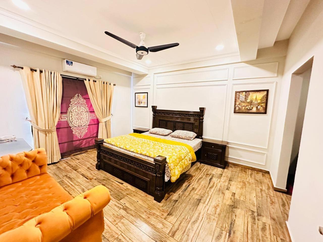 Holidazzle Serviced Apartments Bahria Town Равалпинди Стая снимка